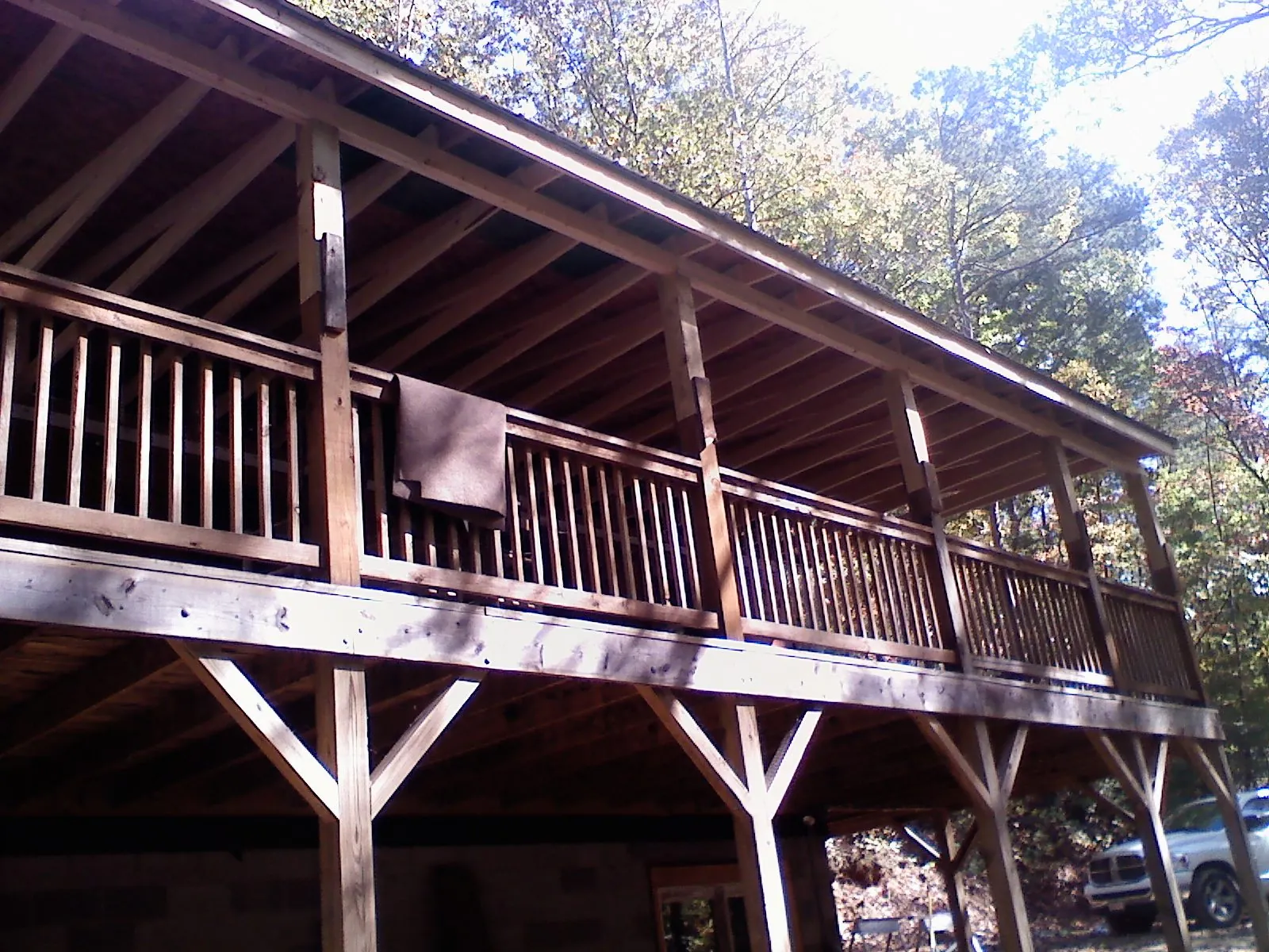 Timber framing under a new elevated porch and deck — Roof Leak Repair in Lake Saint Louis by Roofing Brothers
